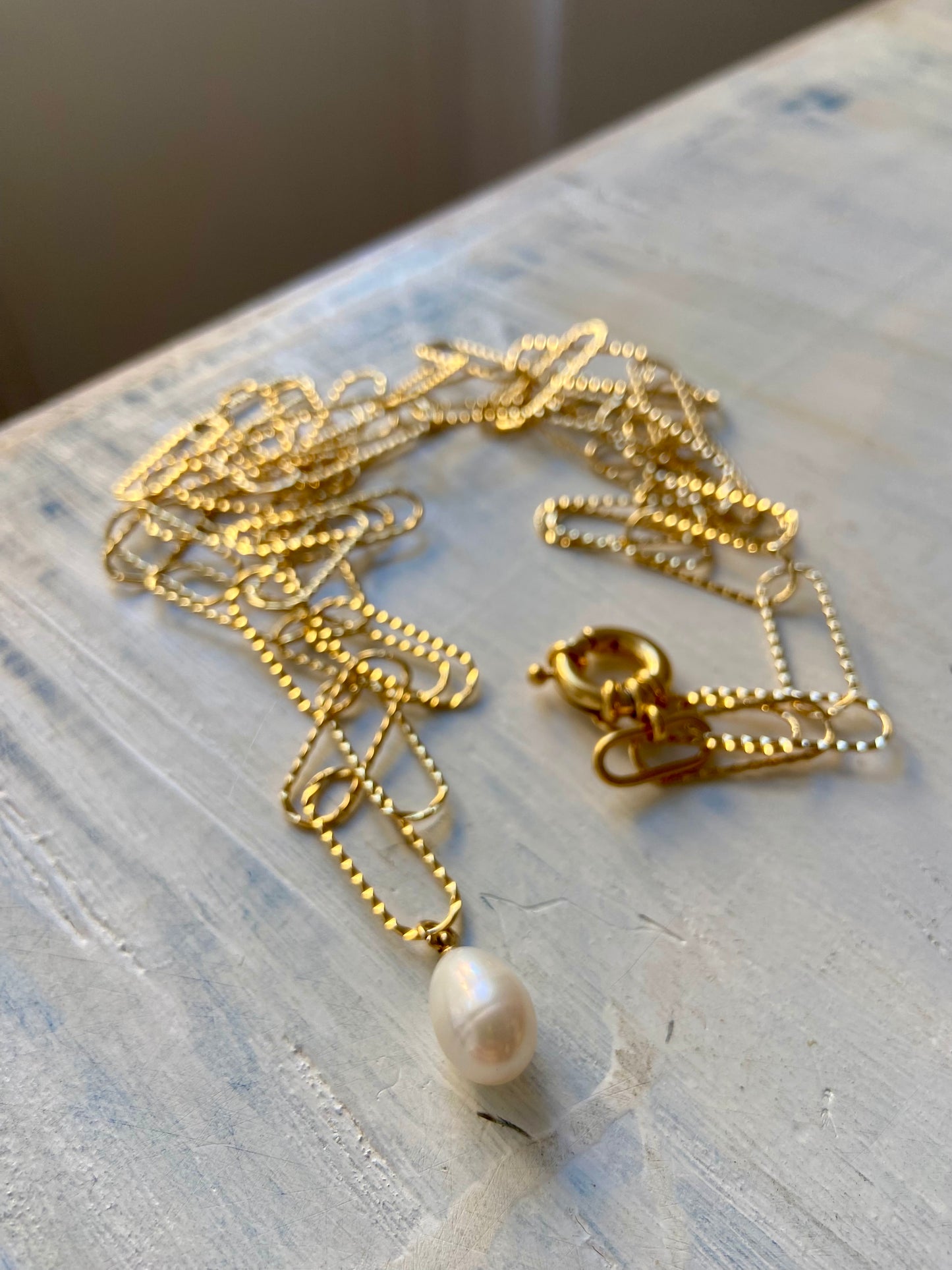 Oro + Perla