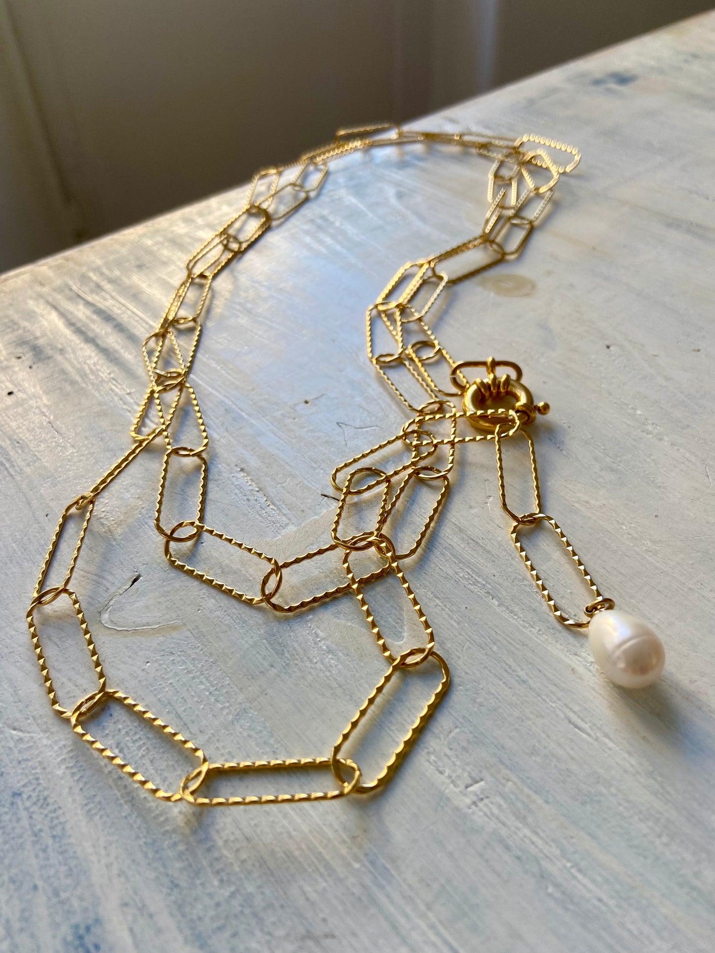 Oro + Perla